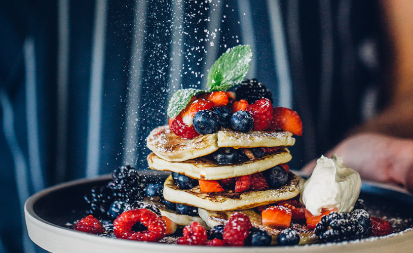 Pancakes with berries, mascarpone and maple syrup from Aqua Bristol